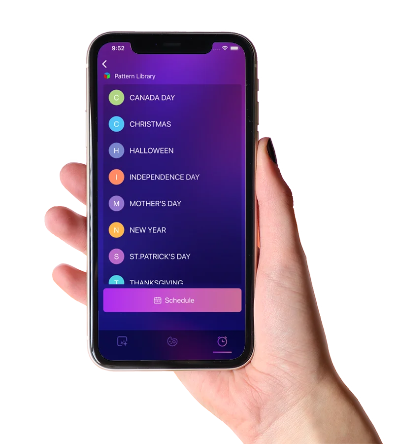 Hand holding a phone with the Trimlight app holiday pattern library